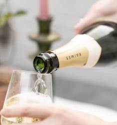 English Sparkling Wine being poured into a galss